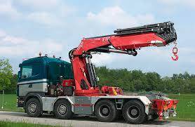 Montage de grue de manutention de marque FASSI sur camion et poids lourds à Alès dans le Gard